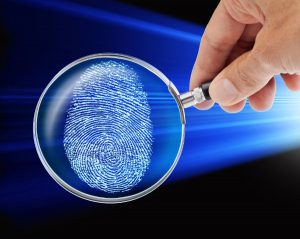 magnifying glass fingerprint criminal