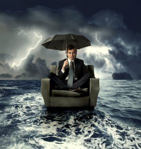 man-sitting-in-rain-bankrupt